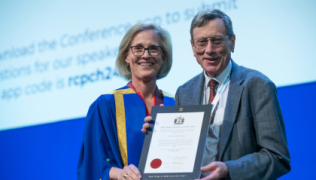 Professor Andy Bush receiving the James Spence Medal from then RCPCH President Dr Camilla Kingdon 