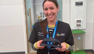 Chiara Piantino, senior clinical physiologist, with a sleep monitoring headband