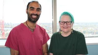 Mr Vinod Patel and Cathie O'Neill stood next to eachother, smiling. 