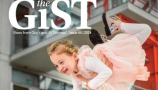 The cover of the GiST Magazine issue for November 2024. On the cover of the magazine, a mother is lifting her child in the air and celebrating at Evelina London Children's Hospital.