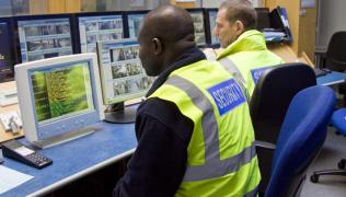Members of the security team monitoring CCTV footage
