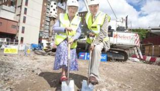 Diana Crawshaw, Chair of the Patient Reference Group, breaks the ground for the new Cancer Centre at Guy’s with Simon Hughes MP in July 2013